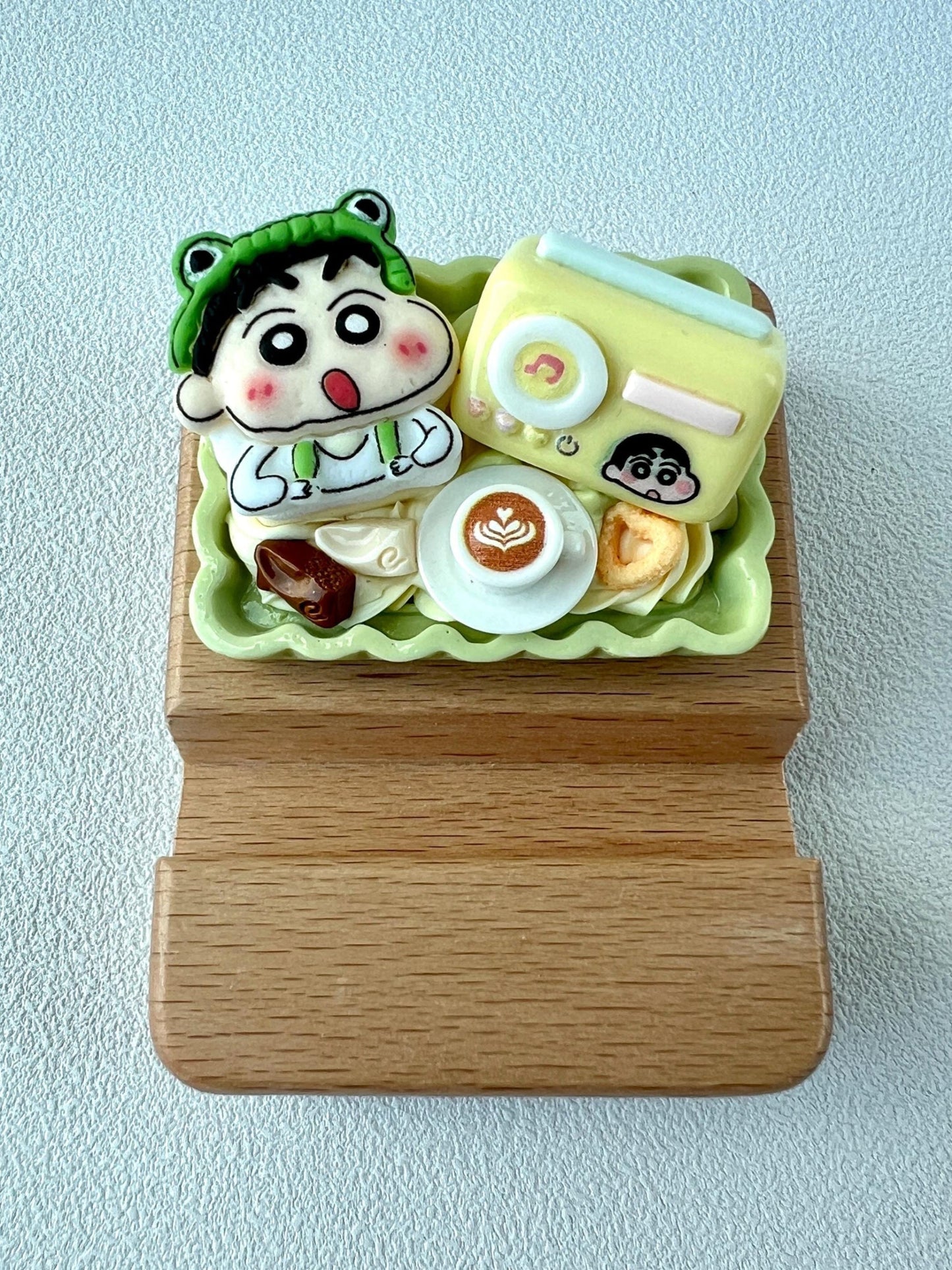 Personalized wooden phone stand with cute crayon shin chan theme engraving"