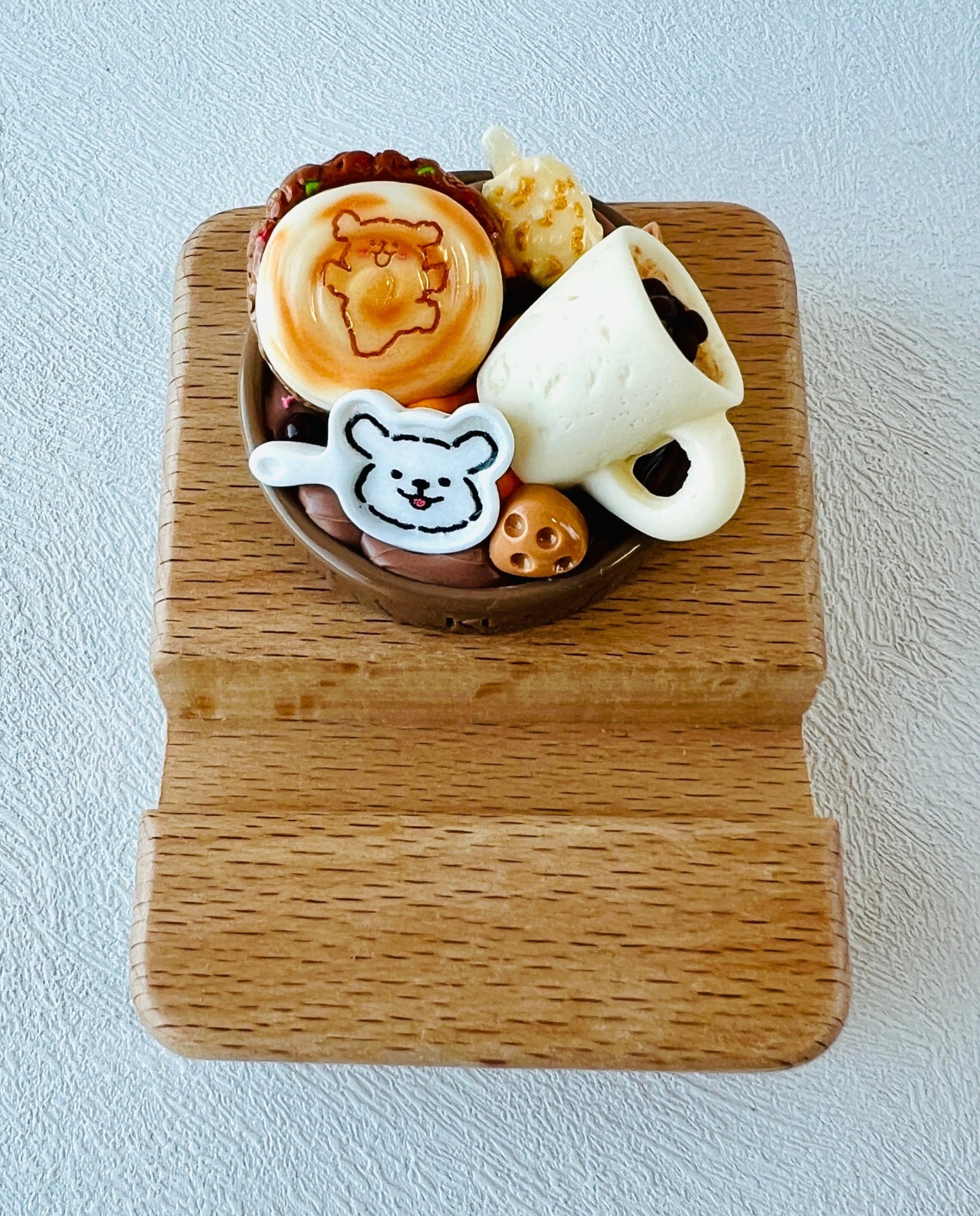 Personalized wooden phone stand with dog theme engraving