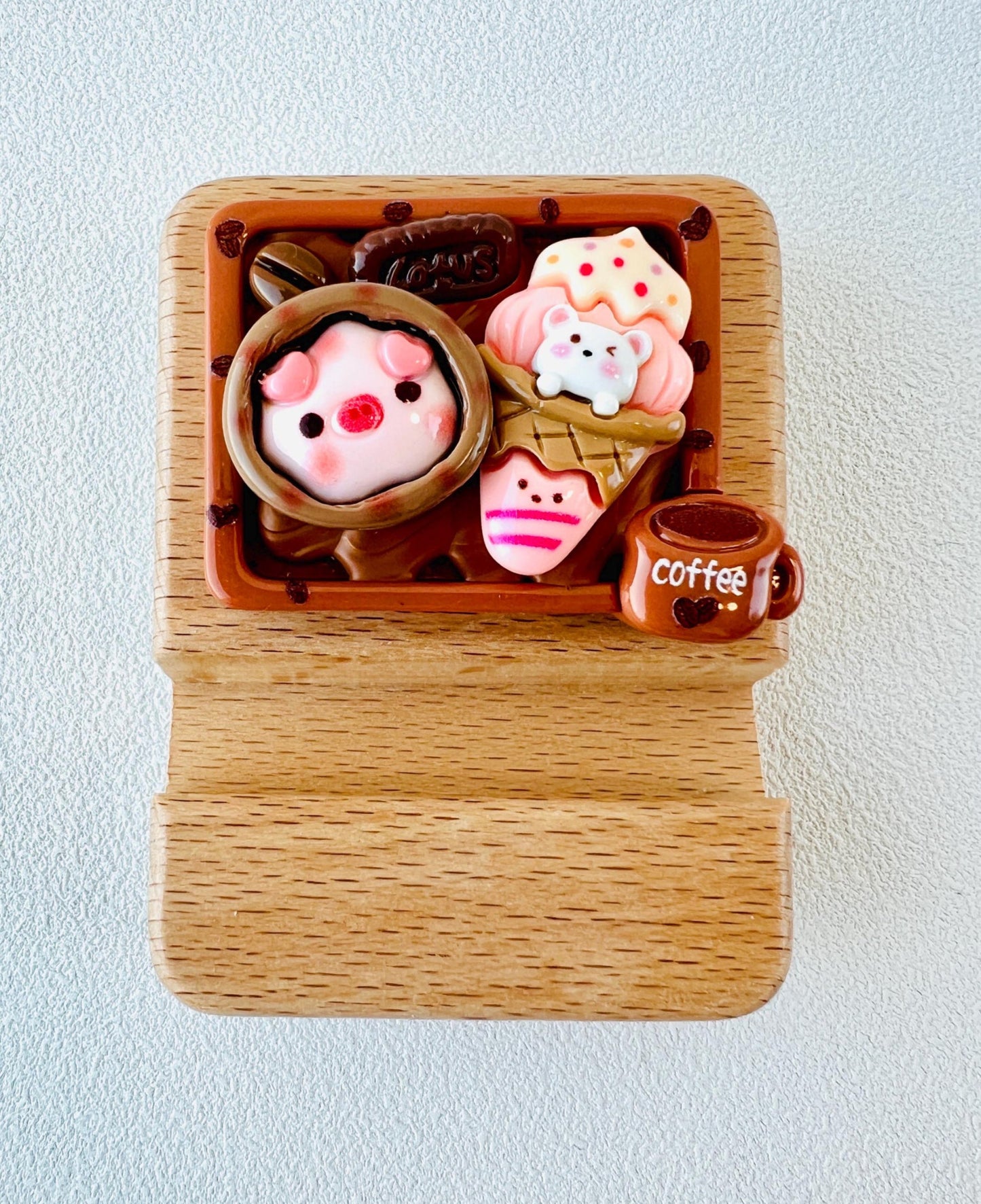 Personalized wooden phone stand with cute pig theme engraving