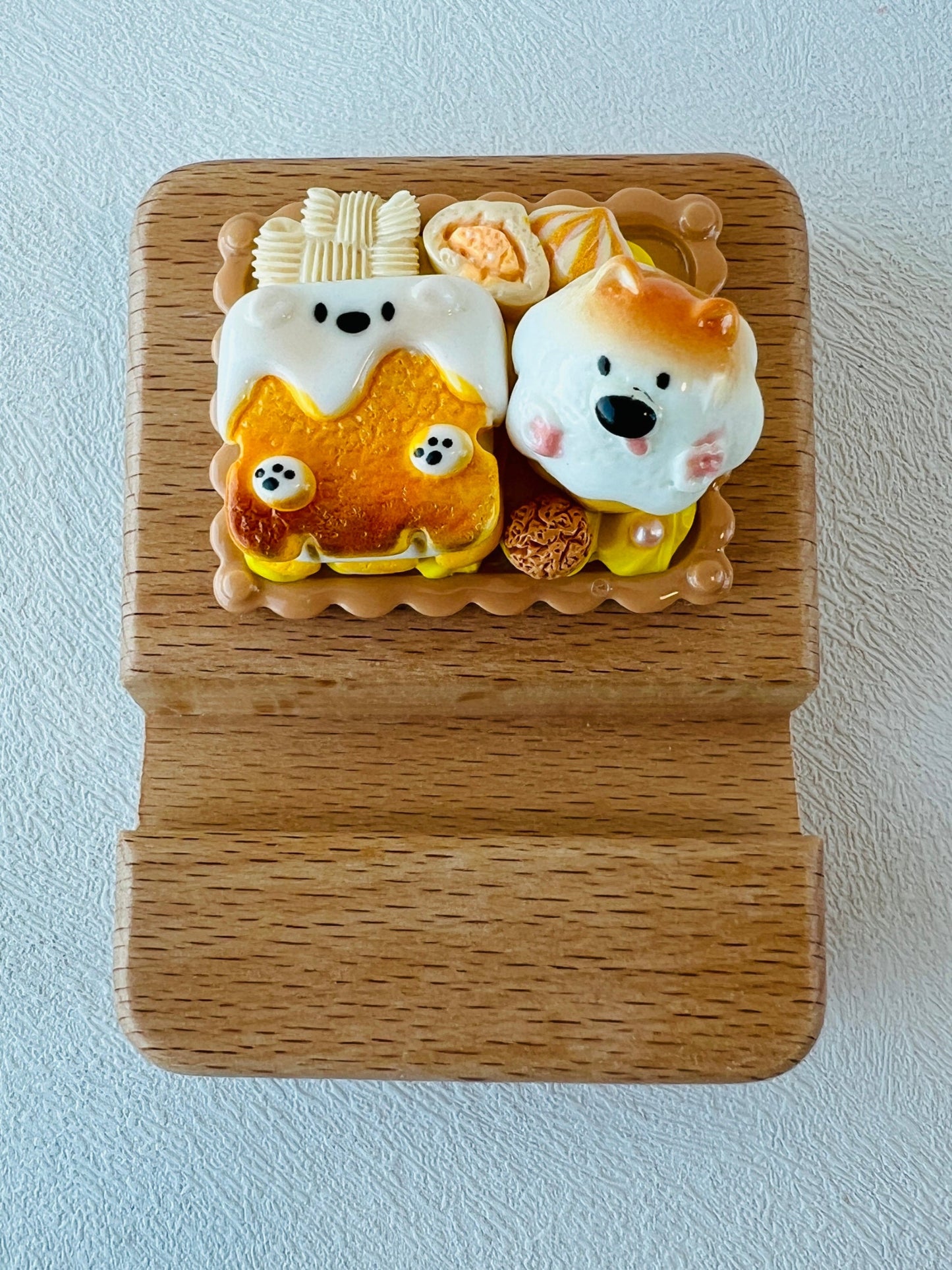 Personalized wooden phone stand with dog theme engraving