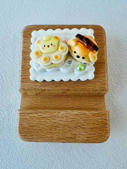 Personalized wooden phone stand with dog theme engraving