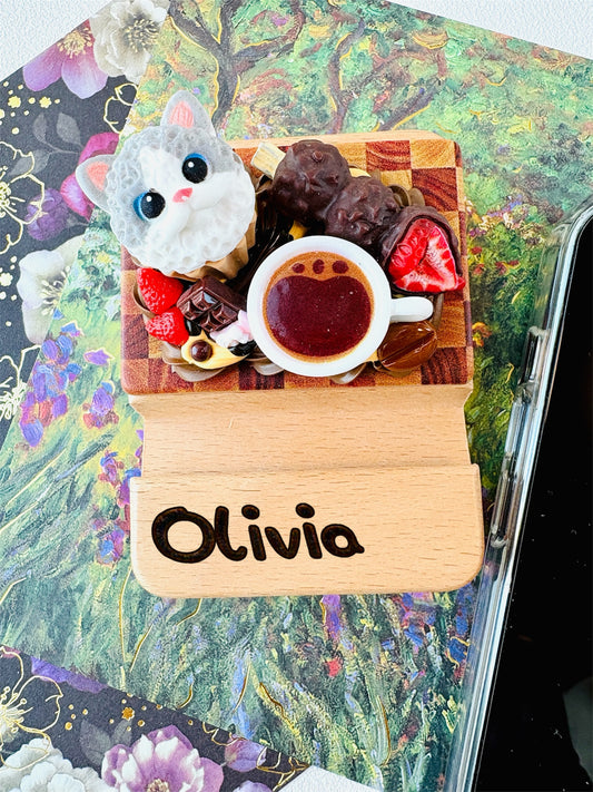 Personalized wooden phone stand with cute cat design